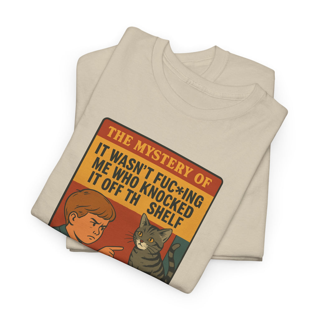 The Mystery Of It Wasnt Me Who Knocked It Off The Shelf - Unisex Cotton Tee